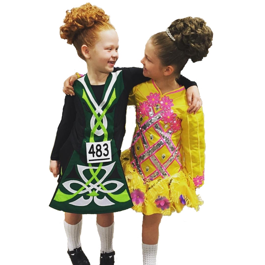 Two recreational dancers smiling together